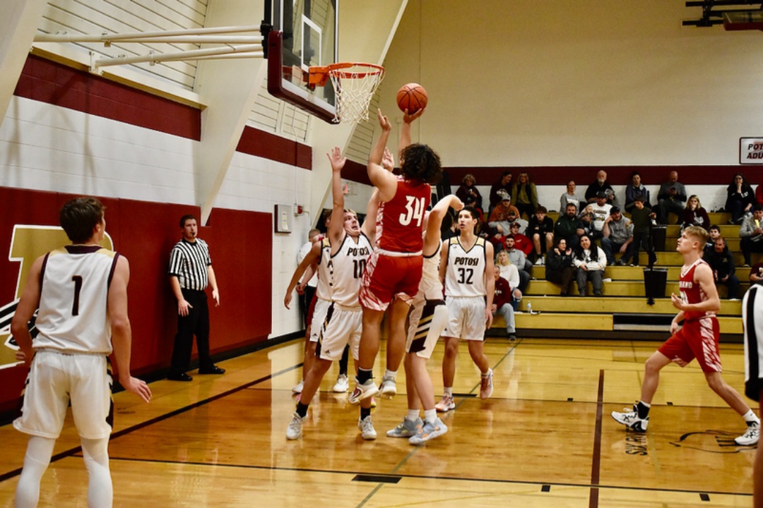 Sam Talo goes for a tough shot in the paint.