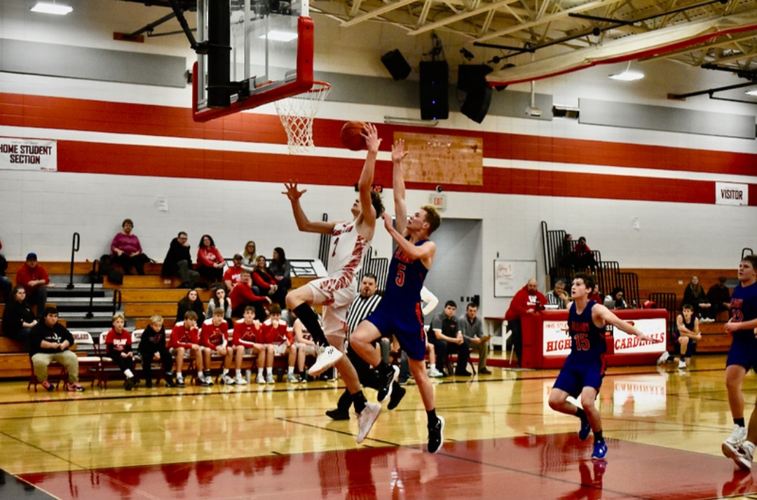 Michael Esser works for a difficult layup.